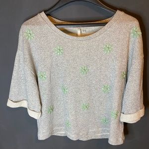 Upgraded pullover with raw hem.